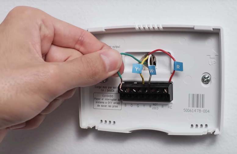 Come installare un termostato Nest, rimuovere le etichette